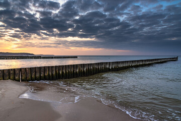 Wall Mural - Beach of Baltic sea in Svetlogorsk at sunset. Kaliningrad region. Russia