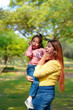 © Niks Ads - Indian woman with her little daughter at park