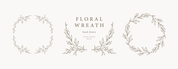 Wall Mural - Hand drawn floral frames, wreaths with flowers, branches and leaves. Elegant logo template. vector illustration for label, branding business identity, wedding invitation