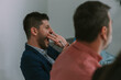 © qunica.com - Close up of business man yawning