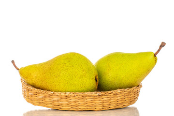 Two sweet pears on a straw plate, macro, isolated on white background.