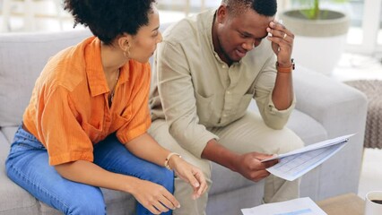 Poster - Black couple, documents and financial crisis on living room sofa discussing mortgage payment or loan at home. Frustrated African man and woman with paperwork in debt, finance issue or money problems