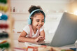 © Clayton Daniels/peopleimages.com - Laptop, home education and happy child elearning, kindergarten homework or remote school work. Knowledge website, learning software and young kid streaming youth development lesson on headphones
