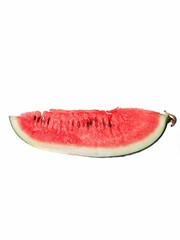 Poster - Closeup of a slice of a watermelon on a white background