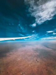 Canvas Print - Outside view taken inside the airplane window