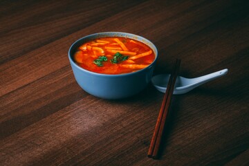 Sticker - Closeup of a traditional Malaysian soup on a table