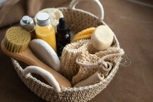 Woven Basket With Natural Body Care Products - Sponge, Towel, Loofah, Soap, Face Brush And Bottles