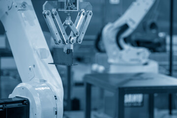 The hi-technology  material handling process by robotic system in turning machine.