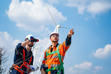 Wall Mural - Wind turbine service engineer maintenance and plan for inspection at construction site, renewable electricity generator.