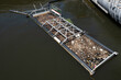 Floating rubbish barges are being used by the City of Melbourne, Australia, to stop litter washing into the Yarra River at Docklands