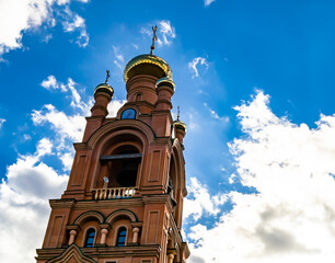 Christian church cross in high steeple tower for prayer