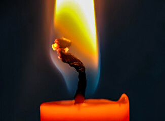 red candle with flame