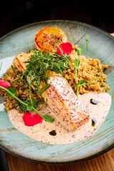 Wall Mural - salmon steak with rice and sauce