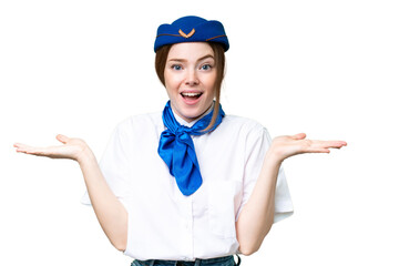 Poster - Airplane stewardess over isolated chroma key background with shocked facial expression