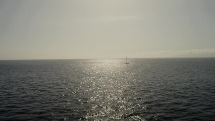 Canvas Print - Aerial view of a boat sailing on the sea at the coastline of Tenerife