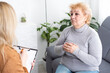 © Angelov - Excited grandmother talking to a psychologist about positive life of pensioner