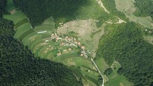 Aerial Top Down View Of A Bosnian Village Surrounded By Forests And Rich Vegetation