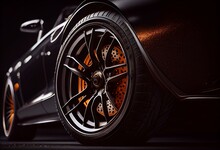 Ground Level Close-up Image Of A Black Sportscar Front Wheel With Light Alloy Rim. Generative AI