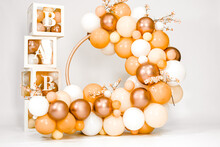 Orange White Bright Balloon Decorated Photo Zone For Little Baby Girl First Birthday Celebration. 1 Year Family Party. Stylish Professional Photoshoot For Kid, Child. Photo Studio. Balloons In Boxes