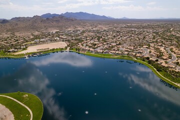 Wall Mural - Aerial view of North Lake and Goodyear, Arizona cityscape with mountains in the background