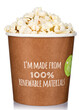 Paper cup with a popcorn on white.