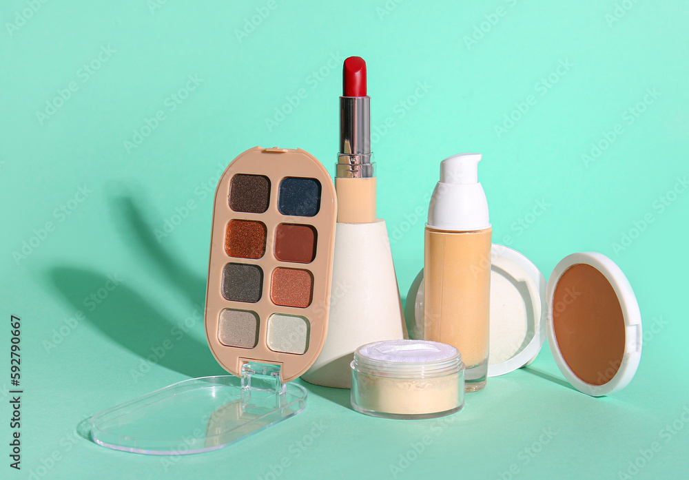 Decorative cosmetics on mint background