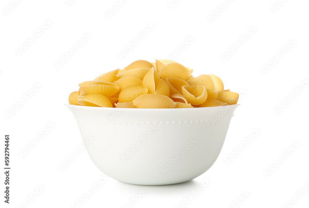 Bowl of raw conchiglie pasta isolated on white background