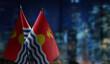 © butenkow - Small flags of the Kiribati on an abstract blurry background