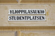Student square, bilingual Helsinki street name sign in Finnish and Swedish. 