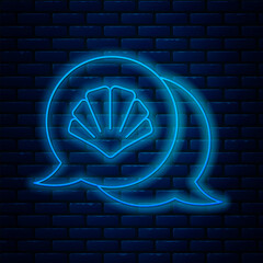 Poster - Glowing neon line Scallop sea shell icon isolated on brick wall background. Seashell sign. Vector