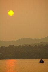 Wall Mural - sunset at the west lake in hangzhou, china