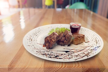 Wall Mural - Roasted tasty beef steak on a plate