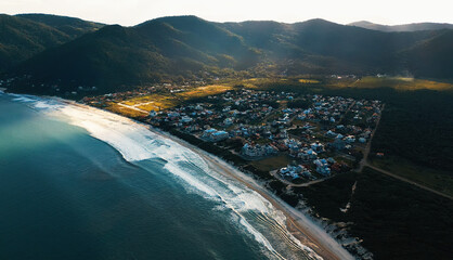 Wall Mural - Aerial view of the Brazilian coastline and the town of Acores, Santa Catarina, Brazil