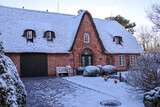 Fototapeta Londyn - Snow Landscape on the island Sylt in Keitum, Germany
