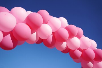 Sticker - Arch made of pink balloons against the blue sky in closeup