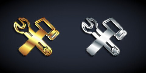 Poster - Gold and silver Crossed hammer and wrench spanner icon isolated on black background. Hardware tools. Long shadow style. Vector