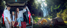 Asian Traveller Family Go To Camping By SUV Car For Sleep By Tent