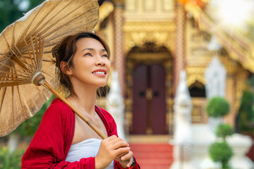 Wall Mural - Asian traveler walking in old pavillion in Temple