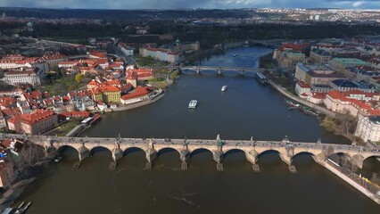 Wall Mural - Scenic spring panoramic aerial view of the Old Town pier architecture and Charles Bridge over Vltava river in Prague, Czech Republic