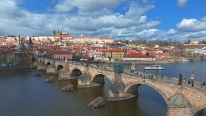 Wall Mural - Scenic spring panoramic aerial view of the Old Town pier architecture and Charles Bridge over Vltava river in Prague, Czech Republic