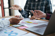 © Parichat - Cropped shot of young smart startup team brainstorming the new idea ti drive the company concept together during the meeting time.