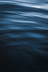 Vertical closeup of dark blue water texture at Lake Tahoe, California
