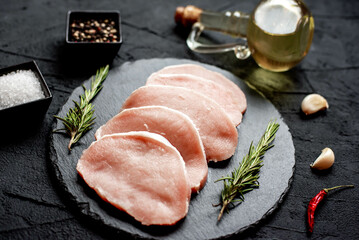 Poster - raw pork fillet on stone background