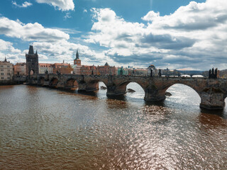 Wall Mural - Scenic spring panoramic aerial view of the Old Town pier architecture and Charles Bridge over Vltava river in Prague, Czech Republic