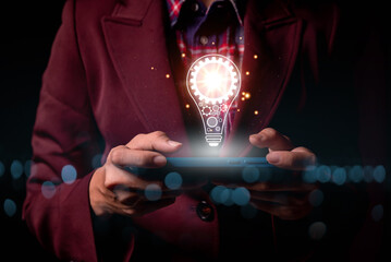 Fototapete - Innovation. Hands holding light bulb for Concept new idea concept with innovation and inspiration, innovative technology in science and communication concept