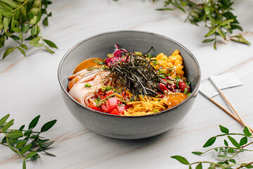 Wall Mural - Portion of gourmet sous vide chicken poke bowl with vegetables