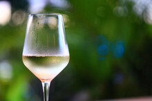 White Wine Tasting, Chilled Ice Wine In A Cold Glass In Summer
