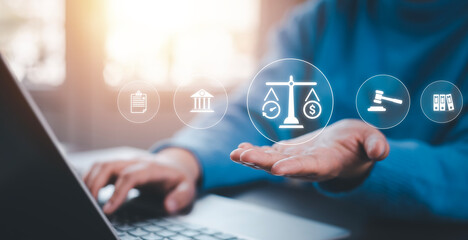 Businessman Hand hold the graph labor law attorney legal business concept internet technology,Planning buy Real Estate, Planning to buy property and Choose the best, financial liabilities concept