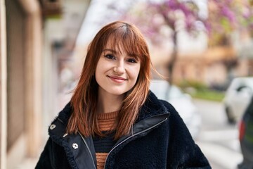 Poster - Young woman smiling confident standing at street