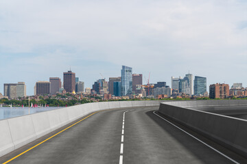 Empty urban asphalt road exterior with city buildings background. New modern highway concrete construction. Concept of way to success. Transportation logistic industry fast delivery. Boston. USA.